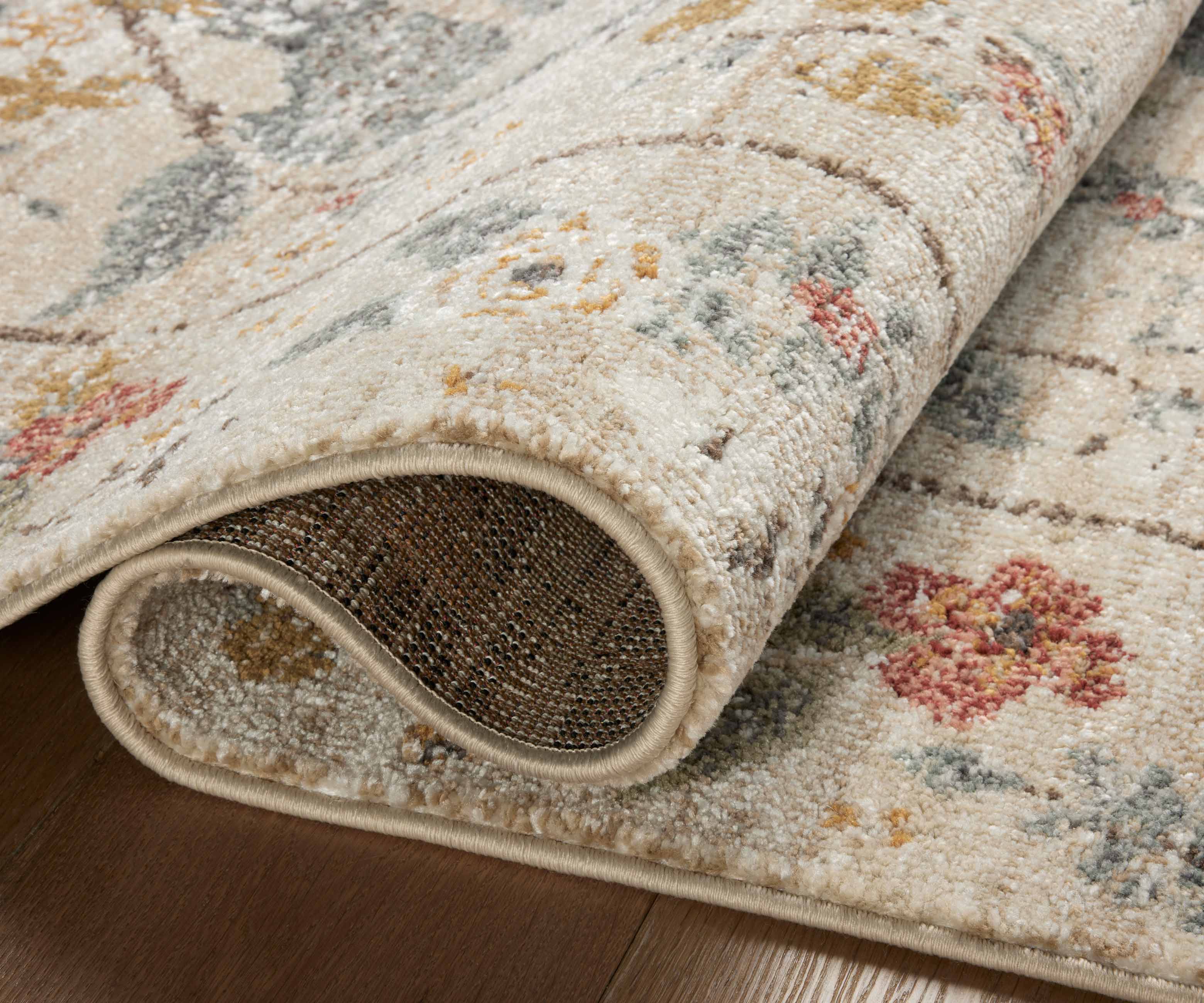 Laurel Peacock Garden Power Loomed Rug - Cream